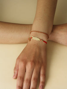 Hot Red Aruba Cord Bracelet Concept Statement